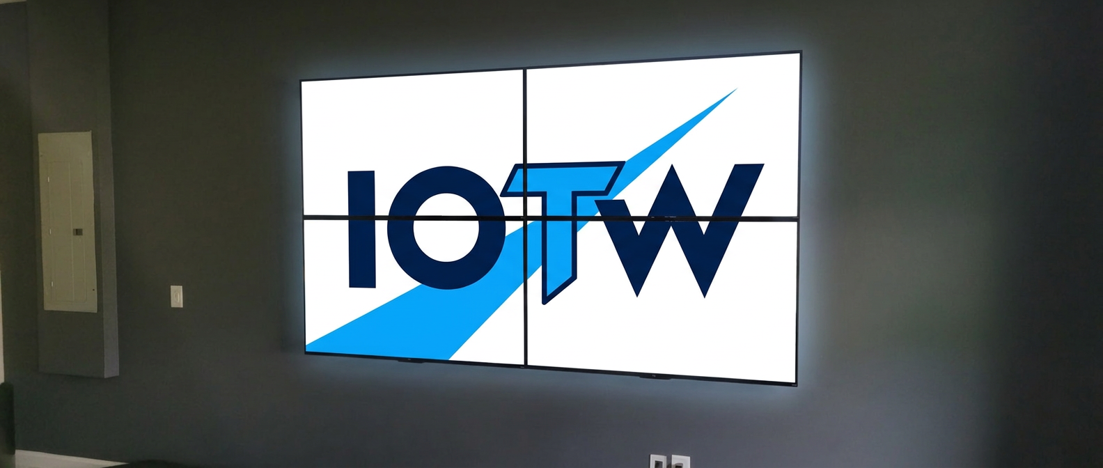 Four-panel commercial video wall mounted flush on an office wall